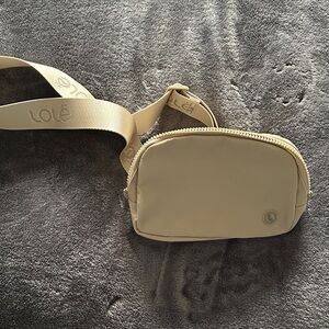 Lole Beige Crossbody Bag with Branded Strap
